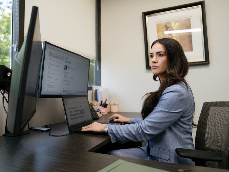 Caroline Burke, Financial Advisor at Laurel Oak Wealth Management concentrates on researching in her office in Marlton, NJ